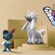 Sneasel, Furfrou, and Butterfree standing on a pedastal against a tan background in Pokemon Go.